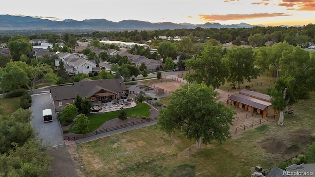 aerial view at dusk with a mountain view