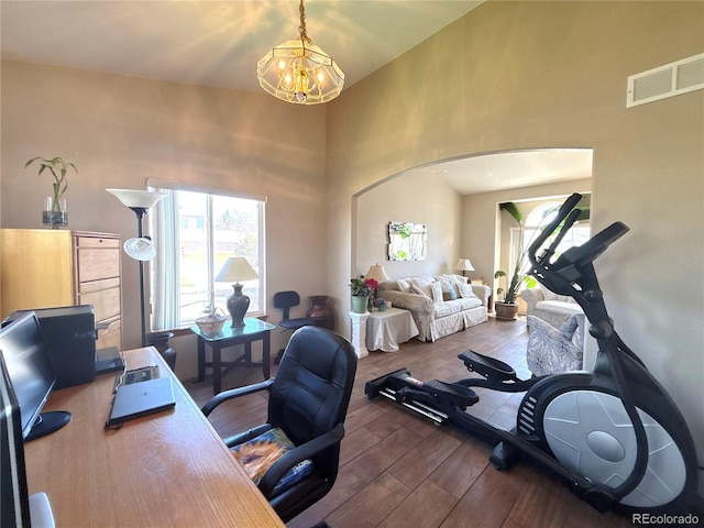 2835 S Tower Way, Aurora, CO 80013 - office area featuring a chandelier, wood finished floors, and a high ceiling
