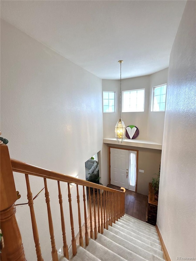 2835 S Tower Way, Aurora, CO 80013 - stairs with wood finished floors