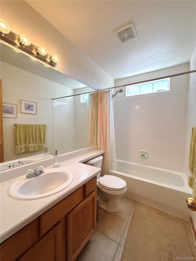 2835 S Tower Way, Aurora, CO 80013 - bathroom featuring tile patterned flooring, shower / tub combo with curtain, vanity, and toilet