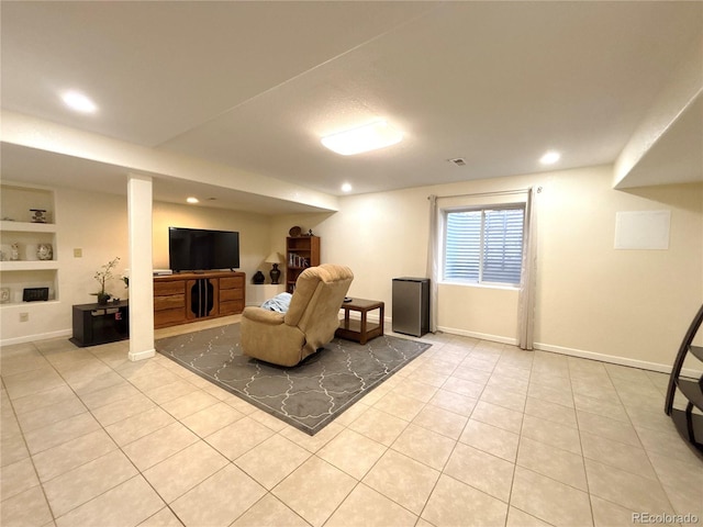2835 S Tower Way, Aurora, CO 80013 - tiled living room featuring baseboards, built in features, and recessed lighting