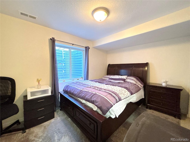 2835 S Tower Way, Aurora, CO 80013 - bedroom featuring carpet floors and a textured ceiling