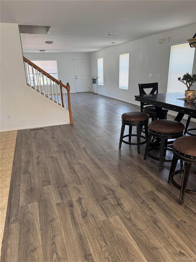20530 Randolph Pl, Denver, CO 80249 - dining room with wood finished floors, stairs, and baseboards