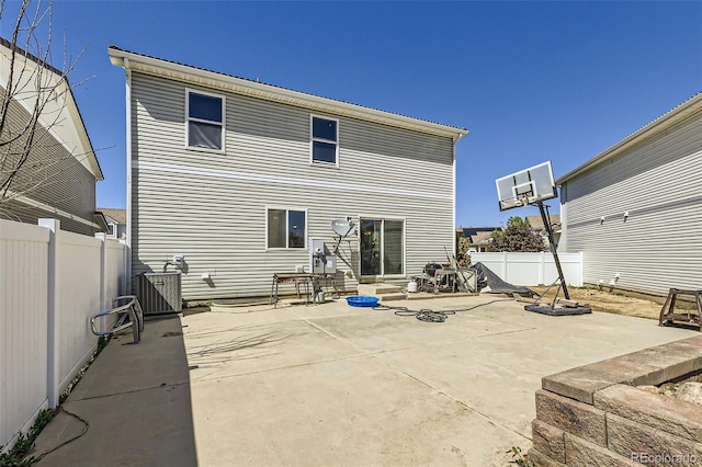 20530 Randolph Pl, Denver, CO 80249 - back of property featuring a patio, a fenced backyard, and entry steps