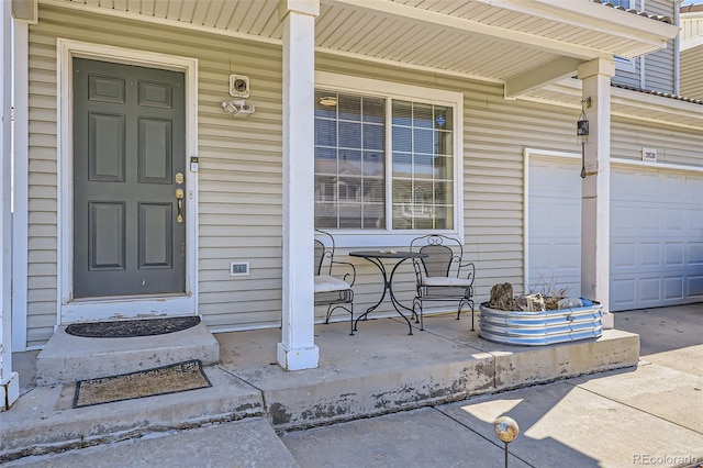 20530 Randolph Pl, Denver, CO 80249 - property entrance with a porch and a garage