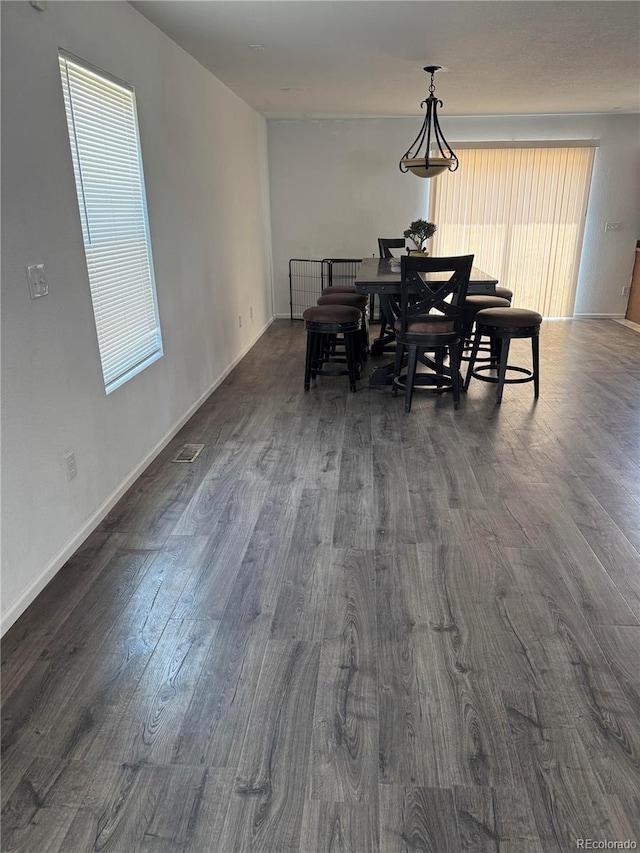 20530 Randolph Pl, Denver, CO 80249 - dining area featuring dark wood-style flooring