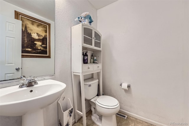 20530 Randolph Pl, Denver, CO 80249 - bathroom with a sink and tile patterned floors