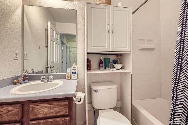 20530 Randolph Pl, Denver, CO 80249 - bathroom with a textured wall, vanity, and shower / bath combo with shower curtain