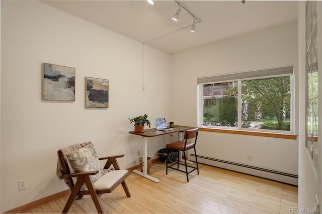 1460 Quince Ave Unit 102, Boulder, CO 80304 - office space with a baseboard heating unit, track lighting, and wood finished floors