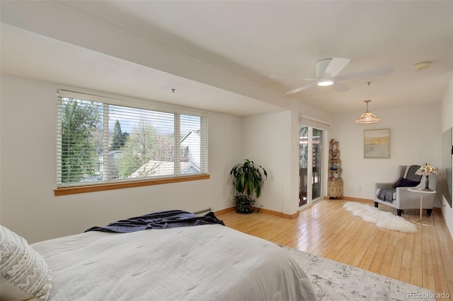 1460 Quince Ave Unit 102, Boulder, CO 80304 - bedroom featuring multiple windows and hardwood / wood-style flooring