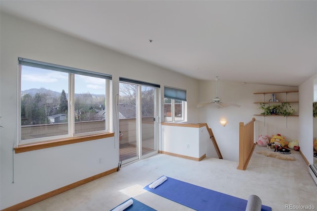 1460 Quince Ave Unit 102, Boulder, CO 80304 - exercise area featuring carpet floors, a ceiling fan, a mountain view, and baseboard heating