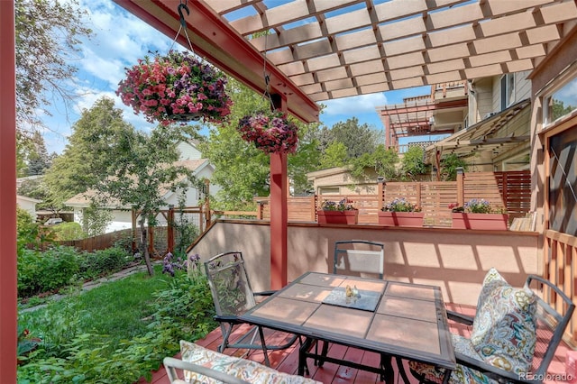 1460 Quince Ave Unit 102, Boulder, CO 80304 - fenced backyard with outdoor dining area and a pergola