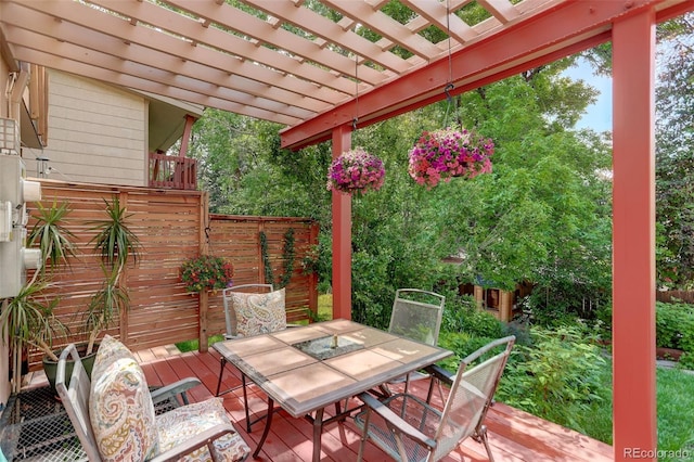 1460 Quince Ave Unit 102, Boulder, CO 80304 - view of patio / terrace with outdoor dining space, a wooden deck, and a pergola