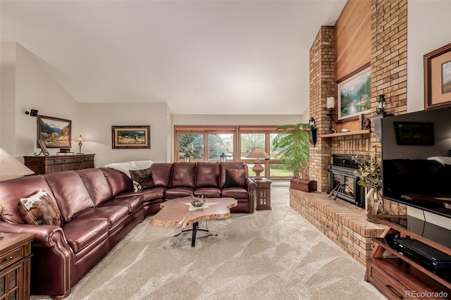 living area with carpet floors, a fireplace, and high vaulted ceiling