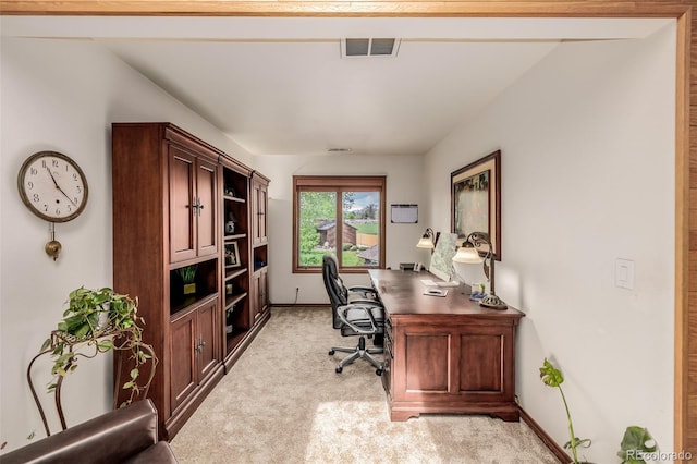 office with light colored carpet, visible vents, and baseboards