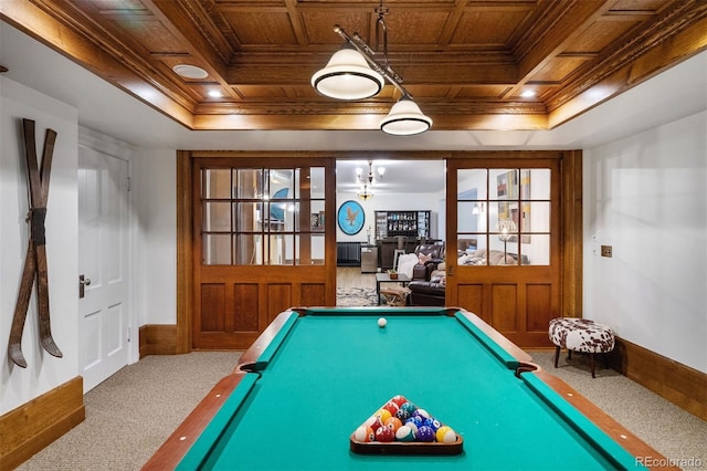 recreation room featuring ornamental molding, coffered ceiling, and wooden ceiling