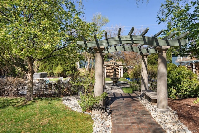 surrounding community featuring a yard and a pergola