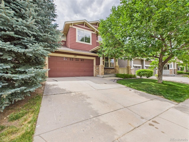 10497 Wagon Box Cir, Highlands Ranch, CO 80130 - craftsman-style house featuring concrete driveway, an attached garage, and a front lawn