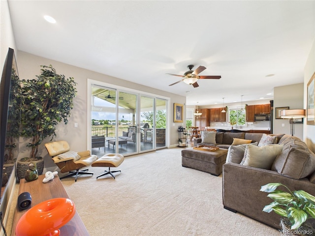 10497 Wagon Box Cir, Highlands Ranch, CO 80130 - living room featuring ceiling fan, light colored carpet, and recessed lighting