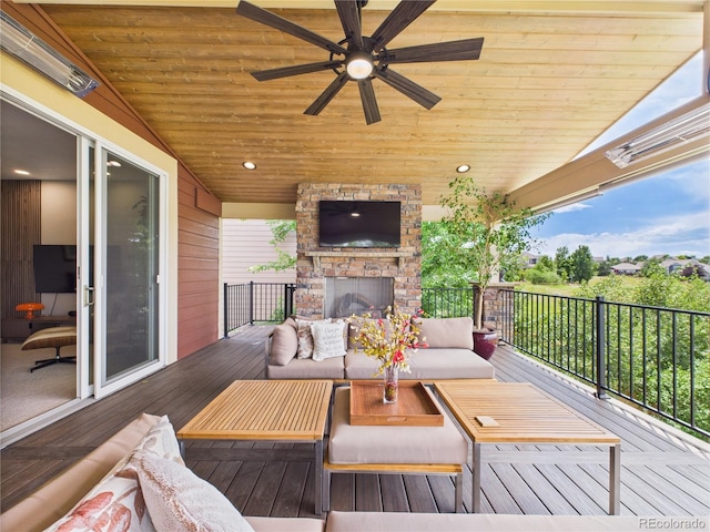 10497 Wagon Box Cir, Highlands Ranch, CO 80130 - deck featuring a ceiling fan and an outdoor living space with a fireplace
