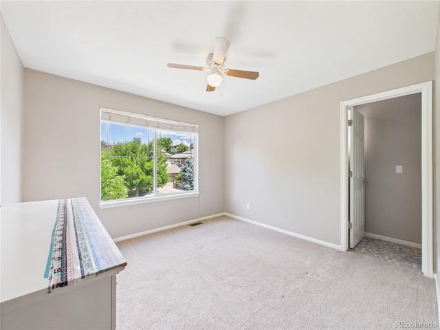 10497 Wagon Box Cir, Highlands Ranch, CO 80130 - unfurnished bedroom featuring carpet floors and a ceiling fan