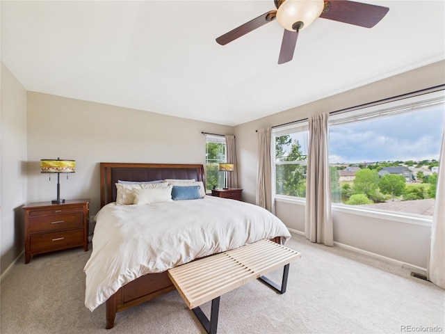 10497 Wagon Box Cir, Highlands Ranch, CO 80130 - carpeted bedroom with vaulted ceiling and ceiling fan
