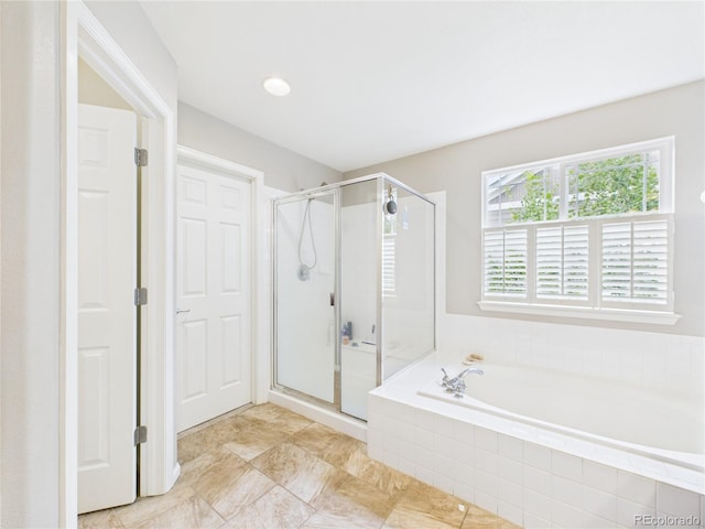 10497 Wagon Box Cir, Highlands Ranch, CO 80130 - bathroom with a garden tub and a stall shower
