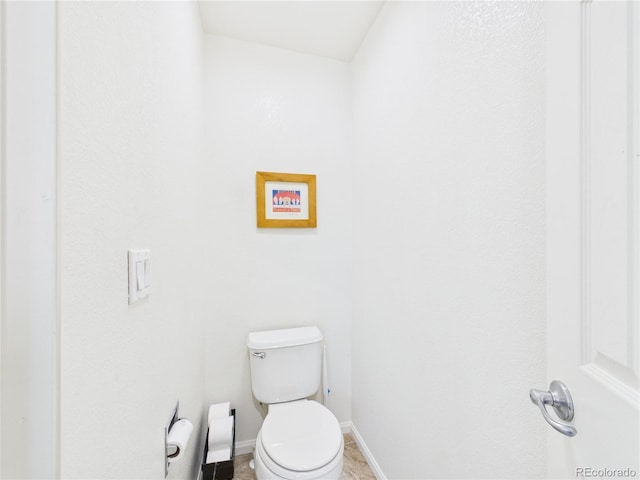 10497 Wagon Box Cir, Highlands Ranch, CO 80130 - bathroom featuring toilet and baseboards
