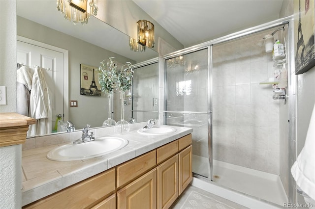 911 Laramie Blvd Unit B, Boulder, CO 80304 - full bathroom featuring a stall shower, double vanity, and a chandelier