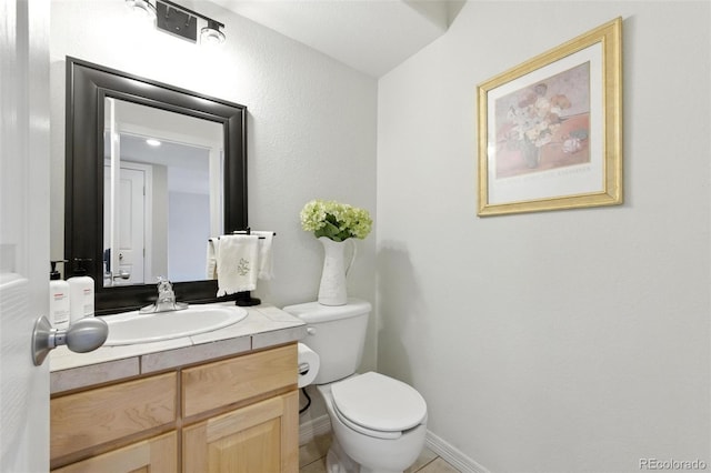 911 Laramie Blvd Unit B, Boulder, CO 80304 - half bathroom featuring vanity and toilet