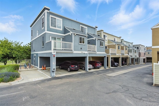 911 Laramie Blvd Unit B, Boulder, CO 80304 - view of building exterior featuring a residential view and covered parking