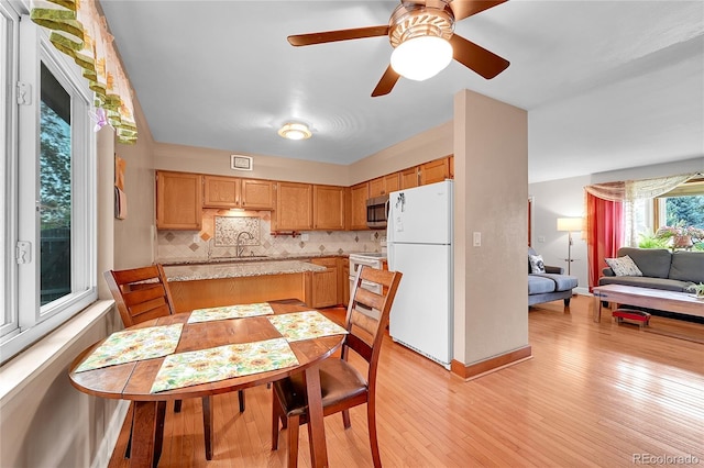 3451 Highland Pl, Westminster, CO 80031 - interior space with baseboards, a ceiling fan, and light wood-type flooring