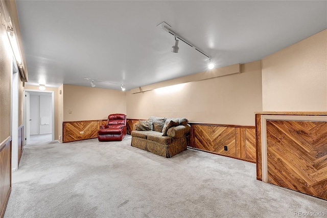 3451 Highland Pl, Westminster, CO 80031 - living area with track lighting, carpet flooring, and wainscoting