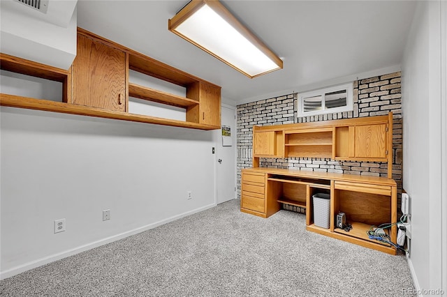 3451 Highland Pl, Westminster, CO 80031 - unfurnished office with light colored carpet, baseboards, brick wall, and visible vents
