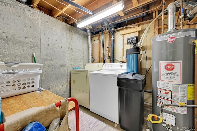 3451 Highland Pl, Westminster, CO 80031 - clothes washing area with laundry area, water heater, and washer and dryer