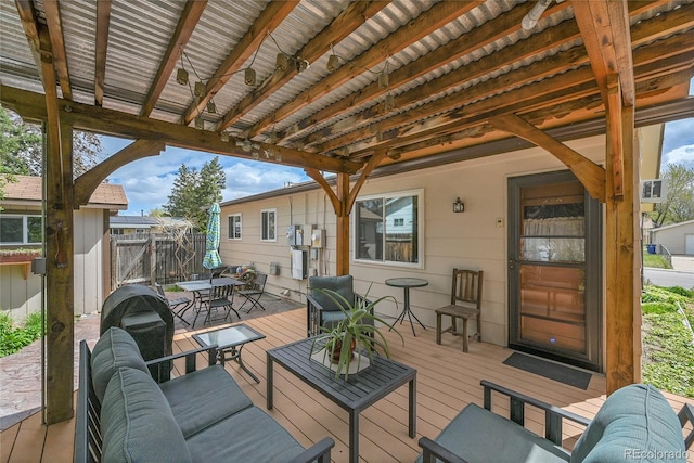3451 Highland Pl, Westminster, CO 80031 - view of patio / terrace featuring an outdoor hangout area, fence, a wooden deck, and outdoor dining space