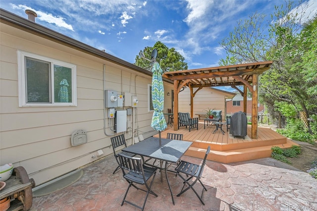 3451 Highland Pl, Westminster, CO 80031 - view of patio / terrace with a pergola, a wooden deck, and outdoor dining area