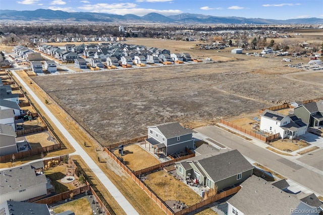 bird's eye view featuring a residential view and a mountain view