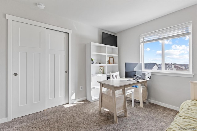 home office with carpet and baseboards