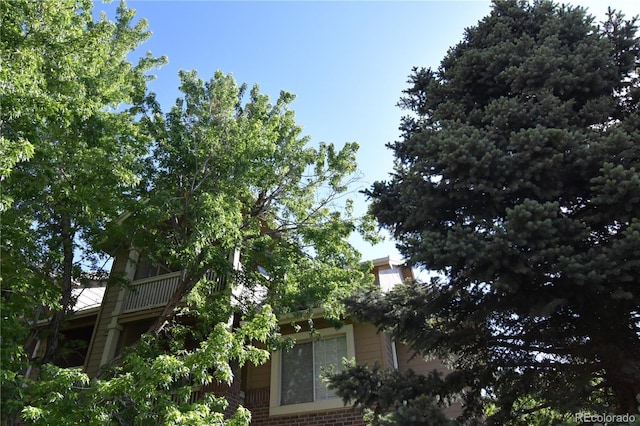 1631 W Canal Cir Unit 832, Littleton, CO 80120 - view of side of home featuring brick siding