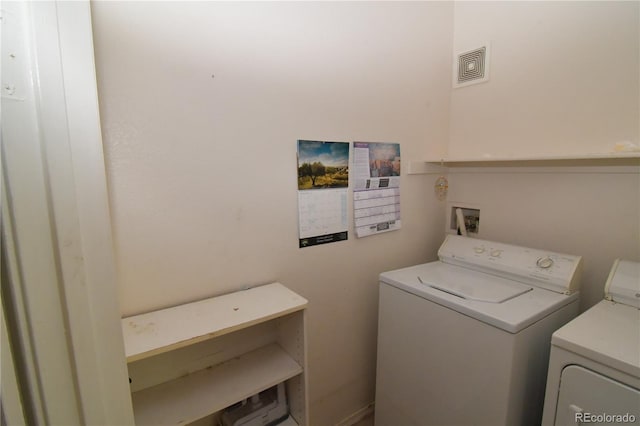 1631 W Canal Cir Unit 832, Littleton, CO 80120 - laundry room with washing machine and clothes dryer