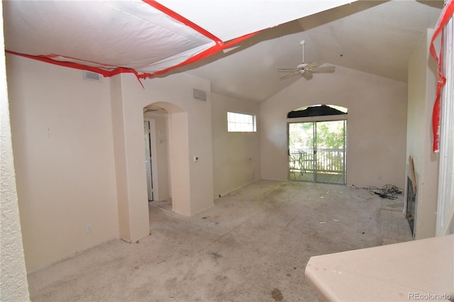 1631 W Canal Cir Unit 832, Littleton, CO 80120 - carpeted empty room with ceiling fan, arched walkways, and vaulted ceiling