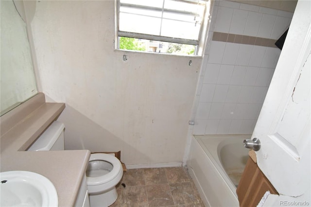 1631 W Canal Cir Unit 832, Littleton, CO 80120 - bathroom featuring toilet, a tub, and vanity