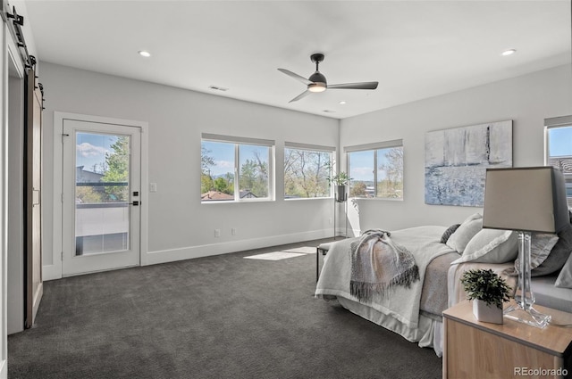 5240 N Raleigh St, Denver, CO 80212 - bedroom featuring a barn door, dark colored carpet, recessed lighting, baseboards, and a ceiling fan