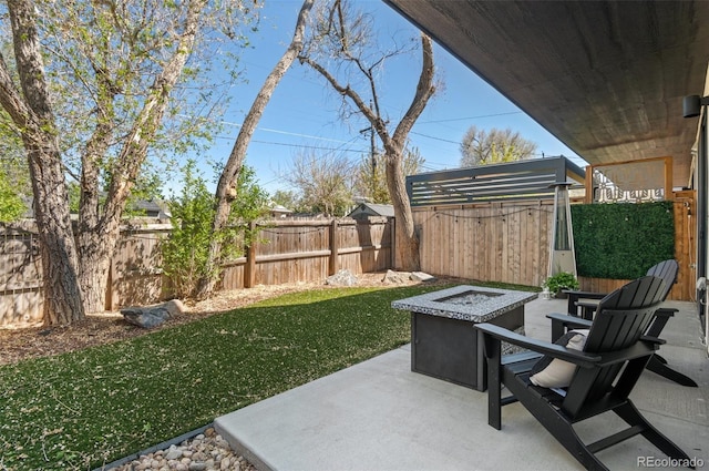 5240 N Raleigh St, Denver, CO 80212 - view of patio with an outdoor fire pit