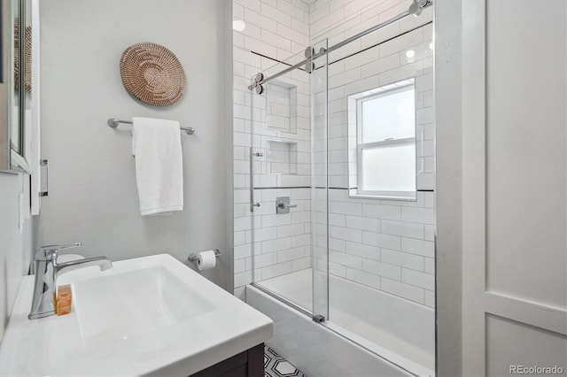 full bath with combined bath / shower with glass door and a sink