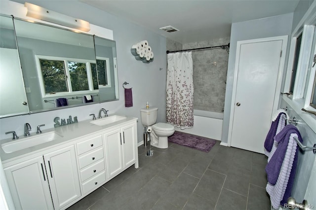 246 Baca Grant Way, Crestone, CO 81131 - full bathroom with toilet, tile patterned floors, visible vents, and a sink