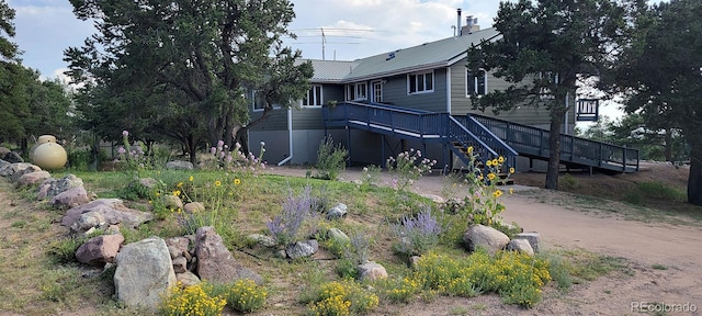 246 Baca Grant Way, Crestone, CO 81131 - view of yard featuring a deck and stairs