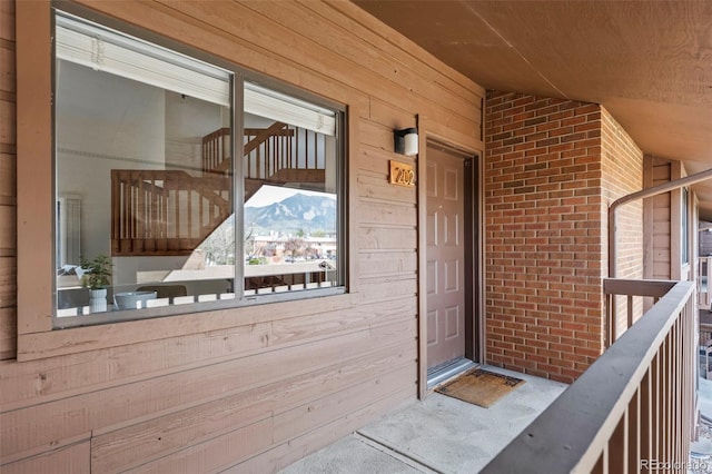 501 Manhattan Dr Unit 202, Boulder, CO 80303 - property entrance featuring brick siding and a balcony