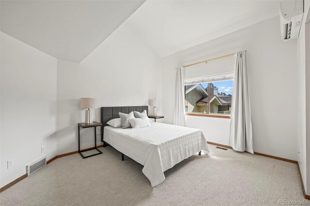 501 Manhattan Dr Unit 202, Boulder, CO 80303 - bedroom featuring lofted ceiling, carpet, and baseboards